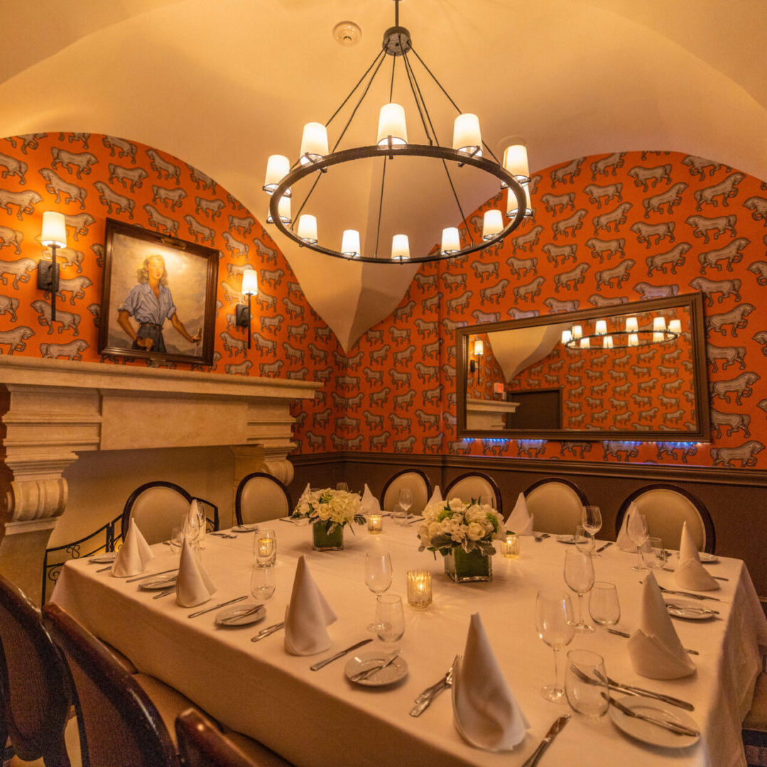 Elegant dining room with warm lighting and classic decor.